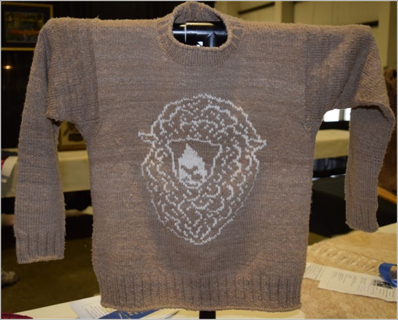 The front of Laurel Stone�s Merino sweater was inspired by one of her flock; the back shows �choose wool.� Photo: Peggy Lundquist.